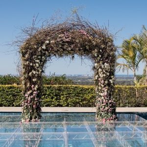 Clear Acrylic Aquatic Stage with Floral Arch